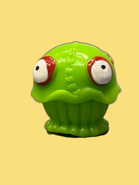 Green toy figure